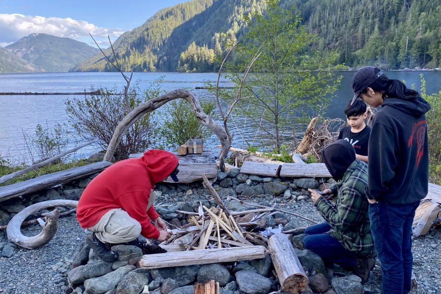 Youth Leaders build a fire near camp (Uchucklesaht Territory)